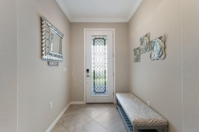 WATERFRONT VILLA IN HIGHLY SOUGHT AFTER ARBOR GRANDE IN LAKEWOOD on Esplanade Golf and Country at Lakewood Ranch in Florida - for sale on GolfHomes.com, golf home, golf lot