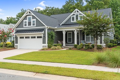 Experience vibrant community living at 6441 Saxon Meadow Drive on Cape Fear National At Brunswick Forest in North Carolina - for sale on GolfHomes.com, golf home, golf lot