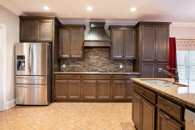 Welcome home to this beautiful well maintained home in Hampton on The Champions Club At Hampton Creek in Tennessee - for sale on GolfHomes.com, golf home, golf lot