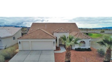 POOL HOME. Spacious 3 bedroom 2.5 bath property located in the on Los Lagos Golf Club in Arizona - for sale on GolfHomes.com, golf home, golf lot
