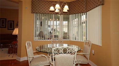 Sought after lake views  in Tamarron. Great curb appeal on Eagle Ridge At Spruce Creek Country Club in Florida - for sale on GolfHomes.com, golf home, golf lot