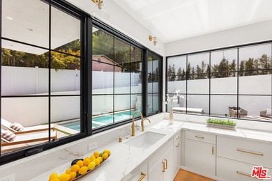 Prepare to be enchanted by one of the most beautiful homes ever on Rancho Park Golf Course in California - for sale on GolfHomes.com, golf home, golf lot