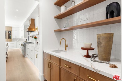 Prepare to be enchanted by one of the most beautiful homes ever on Rancho Park Golf Course in California - for sale on GolfHomes.com, golf home, golf lot