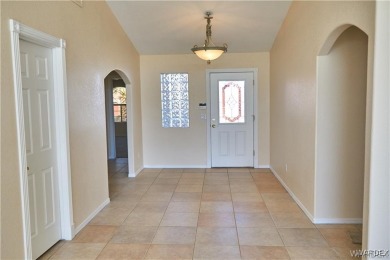 POOL HOME. Spacious 3 bedroom 2.5 bath property located in the on Los Lagos Golf Club in Arizona - for sale on GolfHomes.com, golf home, golf lot