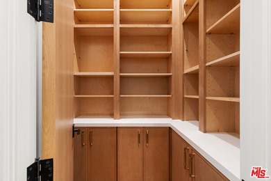 Prepare to be enchanted by one of the most beautiful homes ever on Rancho Park Golf Course in California - for sale on GolfHomes.com, golf home, golf lot