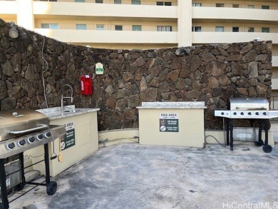 The airy and bright unit overlooking the canal and Ala Wai Golf on Ala Wai Golf Course in Hawaii - for sale on GolfHomes.com, golf home, golf lot