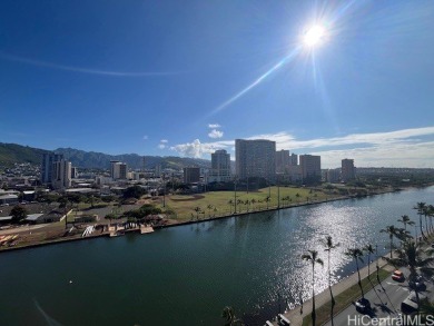 The airy and bright unit overlooking the canal and Ala Wai Golf on Ala Wai Golf Course in Hawaii - for sale on GolfHomes.com, golf home, golf lot