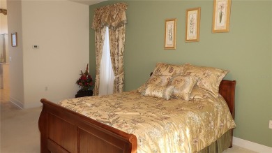 Sought after lake views  in Tamarron. Great curb appeal on Eagle Ridge At Spruce Creek Country Club in Florida - for sale on GolfHomes.com, golf home, golf lot