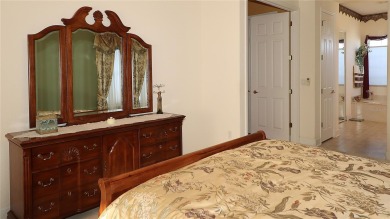 Sought after lake views  in Tamarron. Great curb appeal on Eagle Ridge At Spruce Creek Country Club in Florida - for sale on GolfHomes.com, golf home, golf lot