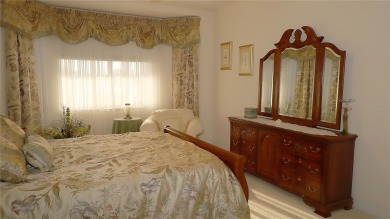 Sought after lake views  in Tamarron. Great curb appeal on Eagle Ridge At Spruce Creek Country Club in Florida - for sale on GolfHomes.com, golf home, golf lot