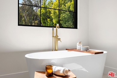 Prepare to be enchanted by one of the most beautiful homes ever on Rancho Park Golf Course in California - for sale on GolfHomes.com, golf home, golf lot