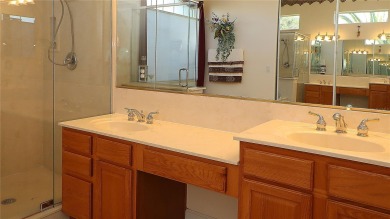 Sought after lake views  in Tamarron. Great curb appeal on Eagle Ridge At Spruce Creek Country Club in Florida - for sale on GolfHomes.com, golf home, golf lot