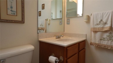 Sought after lake views  in Tamarron. Great curb appeal on Eagle Ridge At Spruce Creek Country Club in Florida - for sale on GolfHomes.com, golf home, golf lot