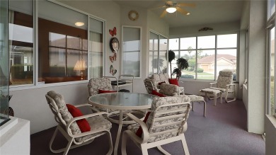 Sought after lake views  in Tamarron. Great curb appeal on Eagle Ridge At Spruce Creek Country Club in Florida - for sale on GolfHomes.com, golf home, golf lot