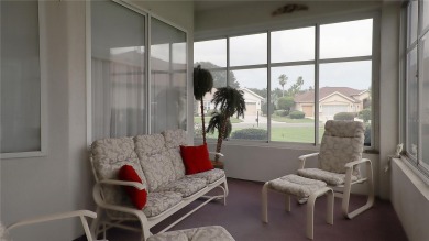 Sought after lake views  in Tamarron. Great curb appeal on Eagle Ridge At Spruce Creek Country Club in Florida - for sale on GolfHomes.com, golf home, golf lot