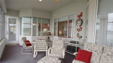 Sought after lake views  in Tamarron. Great curb appeal on Eagle Ridge At Spruce Creek Country Club in Florida - for sale on GolfHomes.com, golf home, golf lot