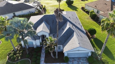 Sought after lake views  in Tamarron. Great curb appeal on Eagle Ridge At Spruce Creek Country Club in Florida - for sale on GolfHomes.com, golf home, golf lot