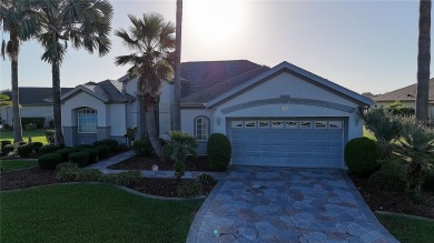 Sought after lake views  in Tamarron. Great curb appeal on Eagle Ridge At Spruce Creek Country Club in Florida - for sale on GolfHomes.com, golf home, golf lot