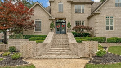 Step into timeless elegance with this expansive three-level home on RidgePointe Country Club in Arkansas - for sale on GolfHomes.com, golf home, golf lot