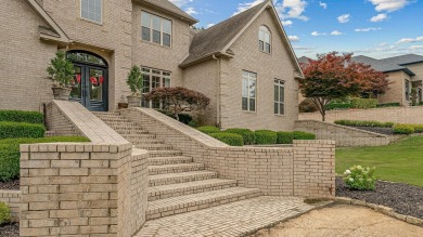 Step into timeless elegance with this expansive three-level home on RidgePointe Country Club in Arkansas - for sale on GolfHomes.com, golf home, golf lot