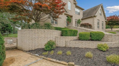 Step into timeless elegance with this expansive three-level home on RidgePointe Country Club in Arkansas - for sale on GolfHomes.com, golf home, golf lot