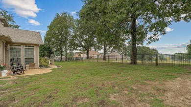 Step into timeless elegance with this expansive three-level home on RidgePointe Country Club in Arkansas - for sale on GolfHomes.com, golf home, golf lot