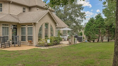 Step into timeless elegance with this expansive three-level home on RidgePointe Country Club in Arkansas - for sale on GolfHomes.com, golf home, golf lot