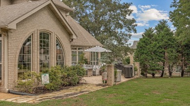 Step into timeless elegance with this expansive three-level home on RidgePointe Country Club in Arkansas - for sale on GolfHomes.com, golf home, golf lot