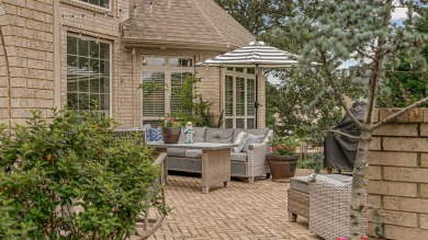 Step into timeless elegance with this expansive three-level home on RidgePointe Country Club in Arkansas - for sale on GolfHomes.com, golf home, golf lot