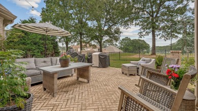 Step into timeless elegance with this expansive three-level home on RidgePointe Country Club in Arkansas - for sale on GolfHomes.com, golf home, golf lot