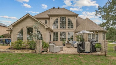 Step into timeless elegance with this expansive three-level home on RidgePointe Country Club in Arkansas - for sale on GolfHomes.com, golf home, golf lot