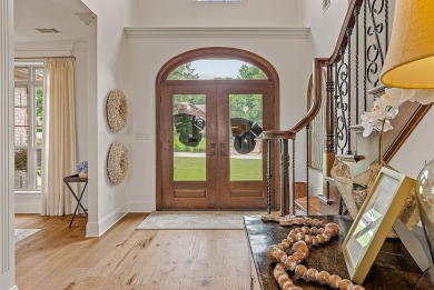 Step into timeless elegance with this expansive three-level home on RidgePointe Country Club in Arkansas - for sale on GolfHomes.com, golf home, golf lot