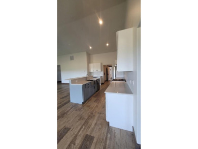 This beautiful, spacious new construction boasts vaulted on Council Mountain Golf Course in Idaho - for sale on GolfHomes.com, golf home, golf lot