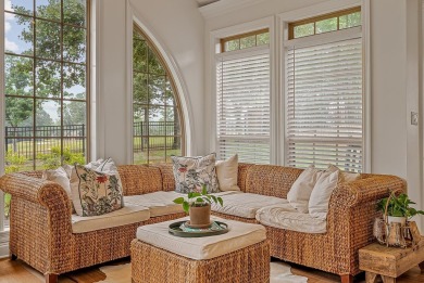 Step into timeless elegance with this expansive three-level home on RidgePointe Country Club in Arkansas - for sale on GolfHomes.com, golf home, golf lot