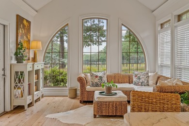 Step into timeless elegance with this expansive three-level home on RidgePointe Country Club in Arkansas - for sale on GolfHomes.com, golf home, golf lot