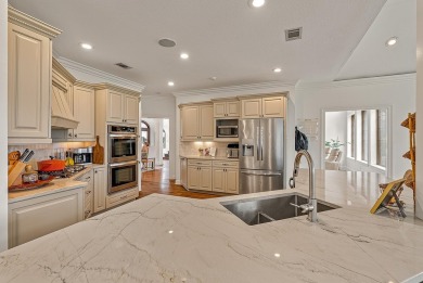 Step into timeless elegance with this expansive three-level home on RidgePointe Country Club in Arkansas - for sale on GolfHomes.com, golf home, golf lot