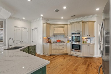 Step into timeless elegance with this expansive three-level home on RidgePointe Country Club in Arkansas - for sale on GolfHomes.com, golf home, golf lot