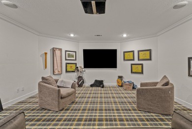 Step into timeless elegance with this expansive three-level home on RidgePointe Country Club in Arkansas - for sale on GolfHomes.com, golf home, golf lot