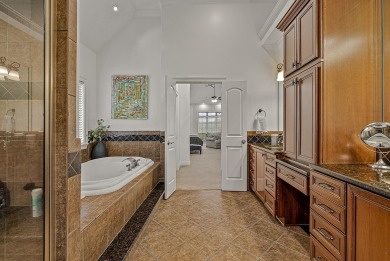Step into timeless elegance with this expansive three-level home on RidgePointe Country Club in Arkansas - for sale on GolfHomes.com, golf home, golf lot