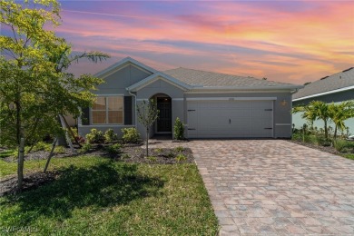 Picture this: a spacious lot with a stunning view of a wooded on Herons Glen Golf and Country Club in Florida - for sale on GolfHomes.com, golf home, golf lot