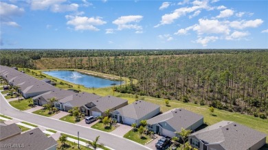 Picture this: a spacious lot with a stunning view of a wooded on Herons Glen Golf and Country Club in Florida - for sale on GolfHomes.com, golf home, golf lot