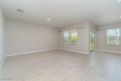 Picture this: a spacious lot with a stunning view of a wooded on Herons Glen Golf and Country Club in Florida - for sale on GolfHomes.com, golf home, golf lot