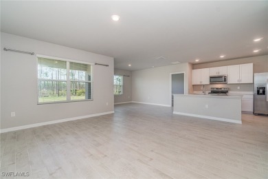 Picture this: a spacious lot with a stunning view of a wooded on Herons Glen Golf and Country Club in Florida - for sale on GolfHomes.com, golf home, golf lot