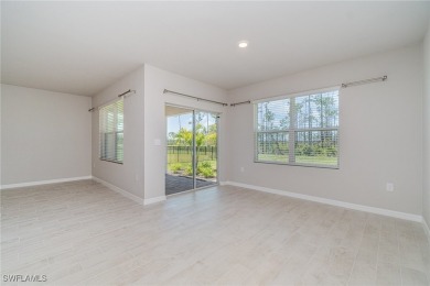Picture this: a spacious lot with a stunning view of a wooded on Herons Glen Golf and Country Club in Florida - for sale on GolfHomes.com, golf home, golf lot