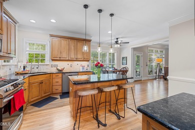 5BR / 4BA on Corner Lot with Double Porches, Screened Porch & on Heritage Golf Club in North Carolina - for sale on GolfHomes.com, golf home, golf lot