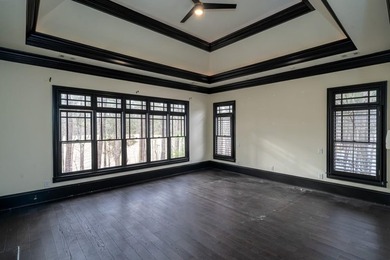 Located in the sought-after Governors Towne Club community, this on The Governors Towne Club in Georgia - for sale on GolfHomes.com, golf home, golf lot