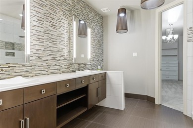 Step through the gates of one of Las Colinas' most coveted on TPC Four Seasons - Las Colinas Resort in Texas - for sale on GolfHomes.com, golf home, golf lot