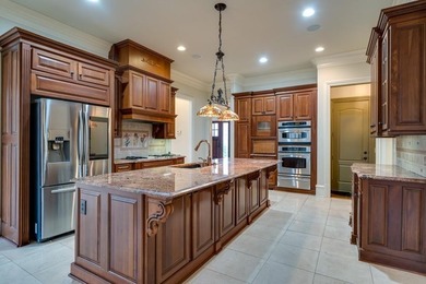 Located in the sought-after Governors Towne Club community, this on The Governors Towne Club in Georgia - for sale on GolfHomes.com, golf home, golf lot