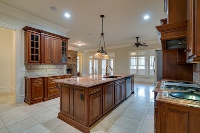 Located in the sought-after Governors Towne Club community, this on The Governors Towne Club in Georgia - for sale on GolfHomes.com, golf home, golf lot