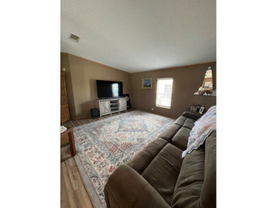 2 bed | 2 bath | 1,080+ sq ft | Lot 1079 | $115,000 on Lake Henry Golf Club in Florida - for sale on GolfHomes.com, golf home, golf lot